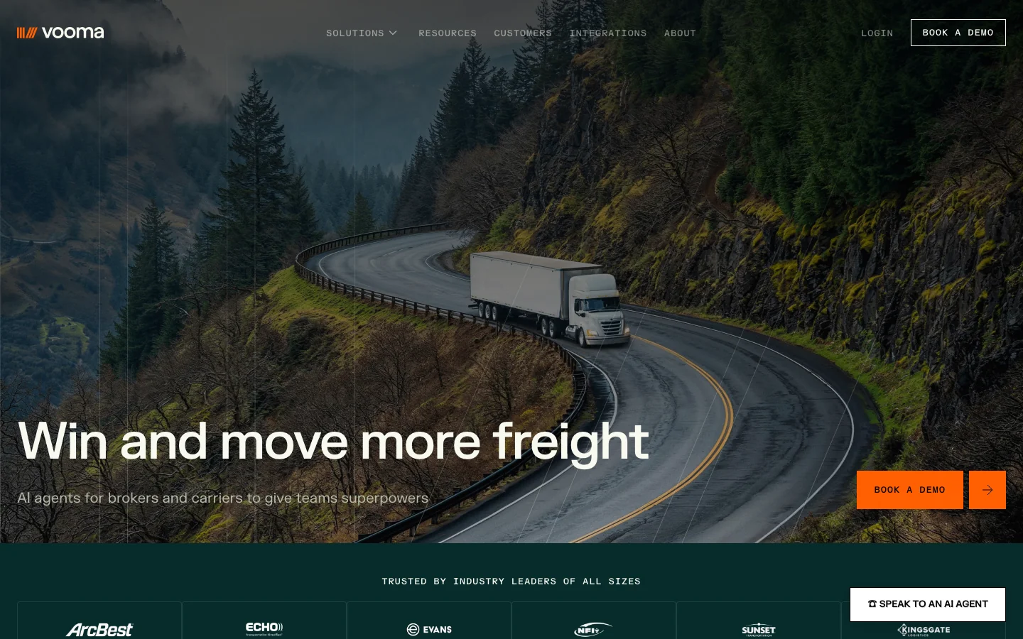 Vooma's homepage, headed Win and move more freight, over a photo of a truck on a winding mountain road